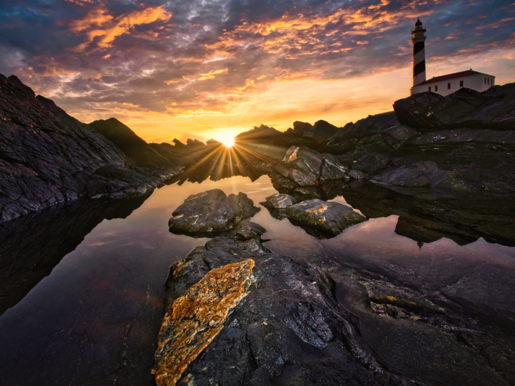faro de favaritx puesta de sol