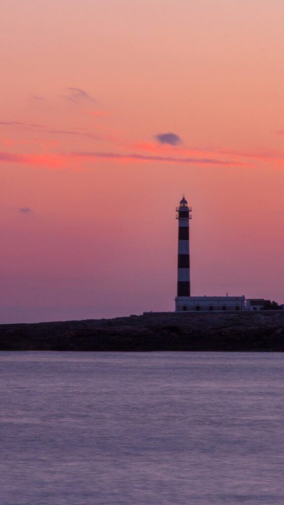 Faro de Artrutx atardecer